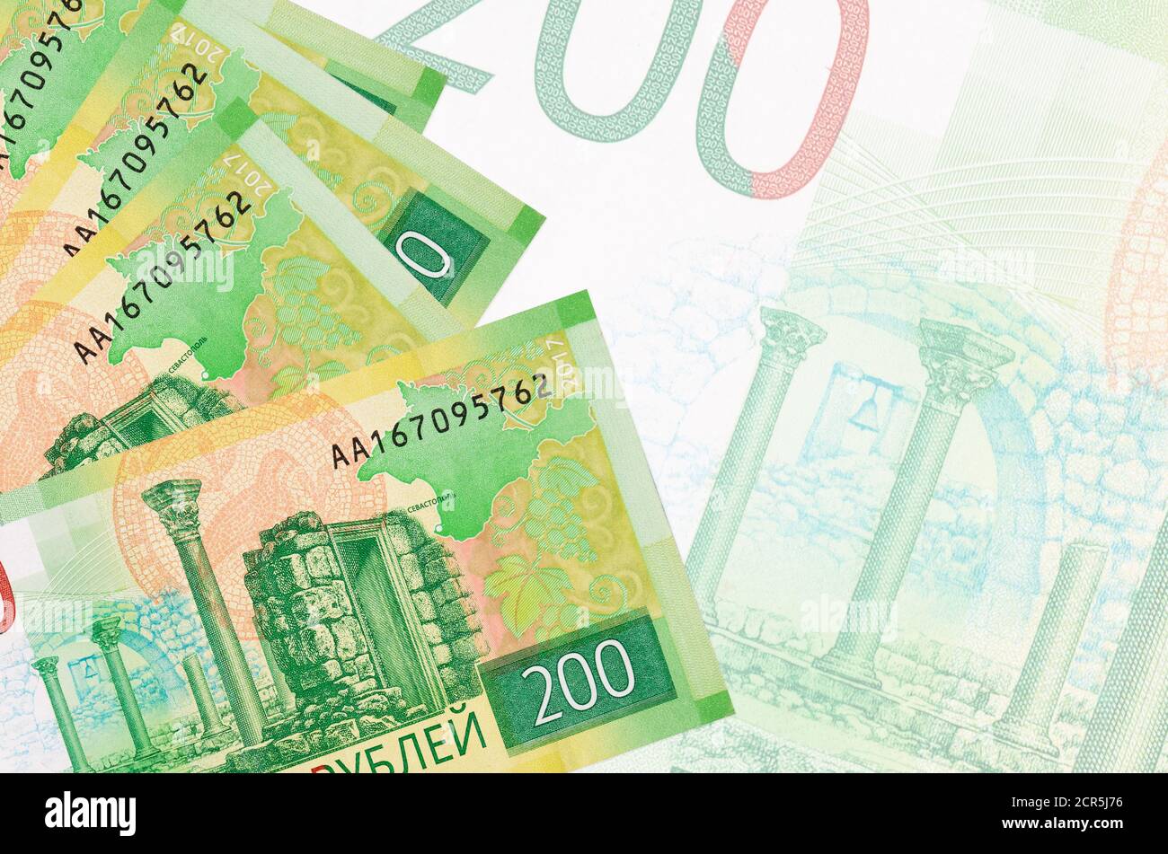 Rub 200 Note 200 russian rubles bills lies in stack on background of big semi ...