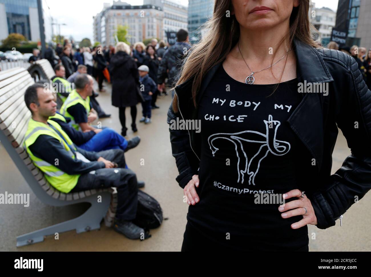 A demonstrator wears a shirt to protest against a proposed parliament bill to completely ban abortion in Poland, in front of European institutions in Brussels, Belgium, October 3, 2016. REUTERS/Francois Lenoir Stock Photo