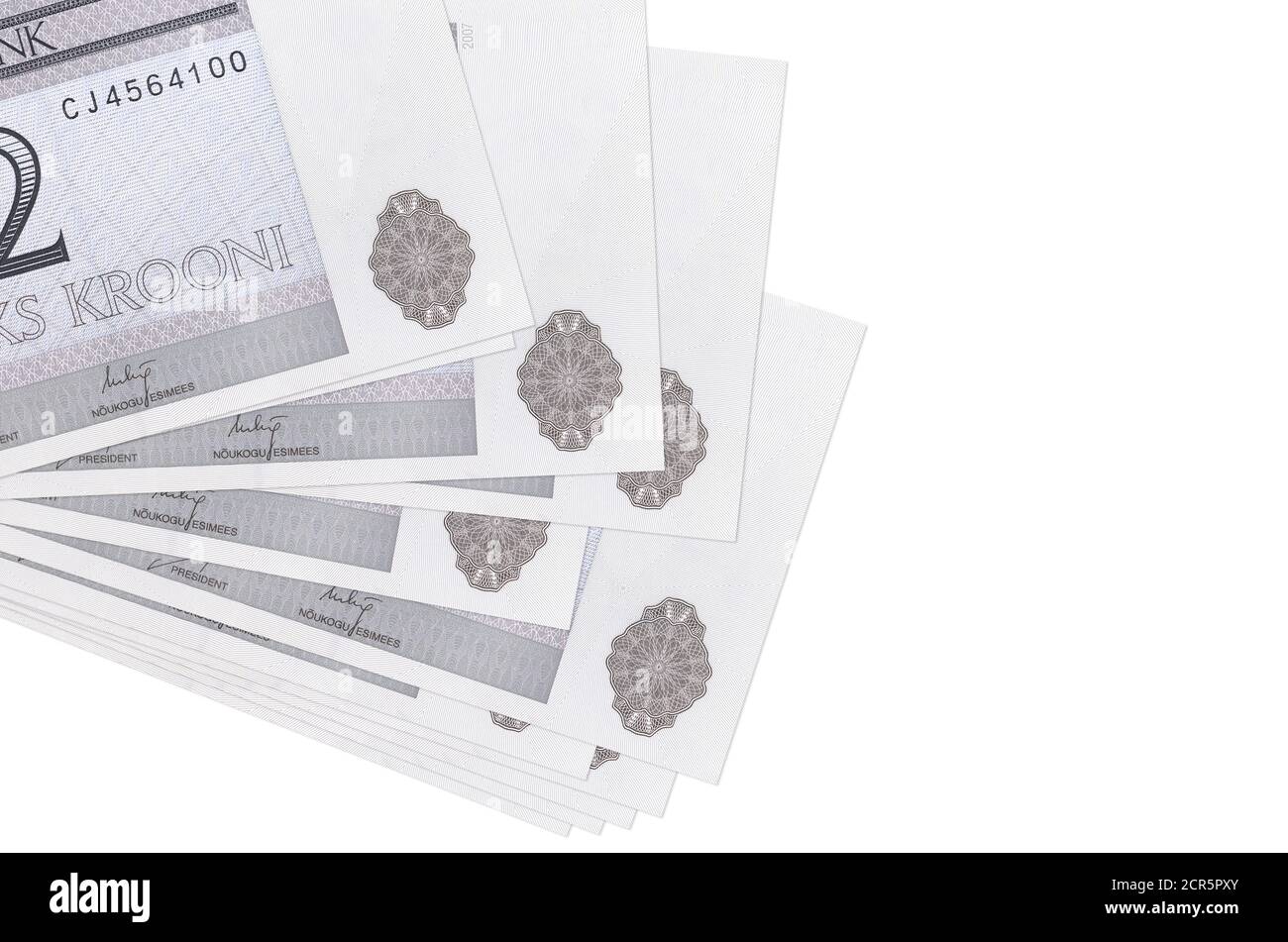 2 Estonian kroon bills lies in small bunch or pack isolated on white. Mockup with copy space. Business and currency exchange concept Stock Photo