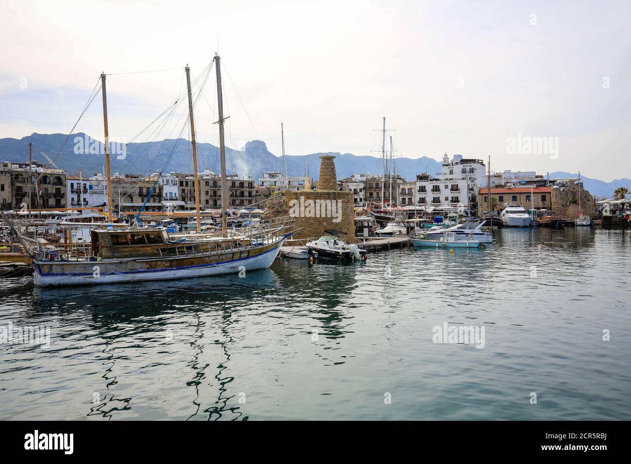 Girne, Turkish Republic of Northern Cyprus, Cyprus - Boats and sailing ships in the port of Girne (Kyrenia). Stock Photo