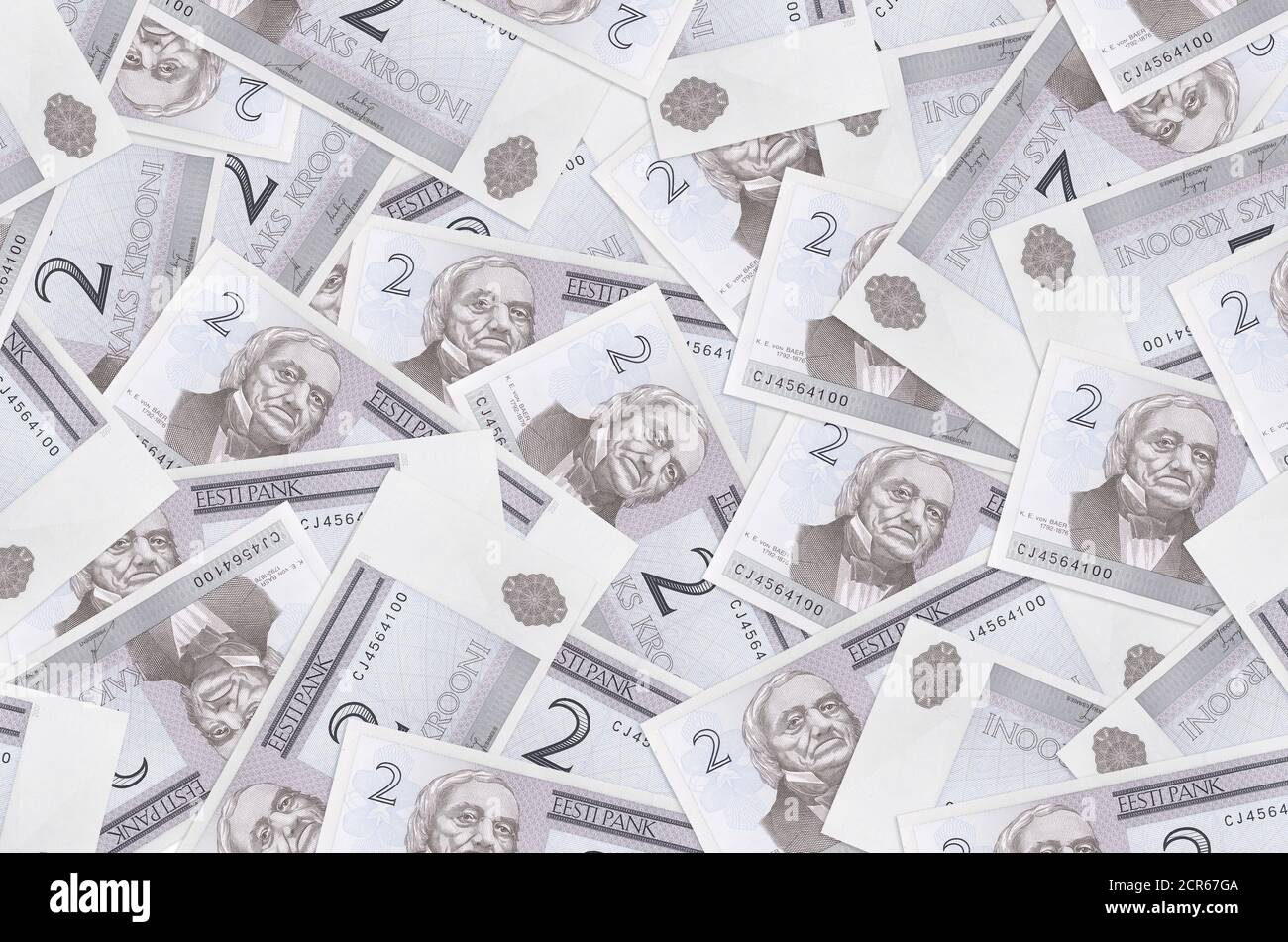 2 Estonian kroon bills lies in big pile. Rich life conceptual background. Big amount of money Stock Photo