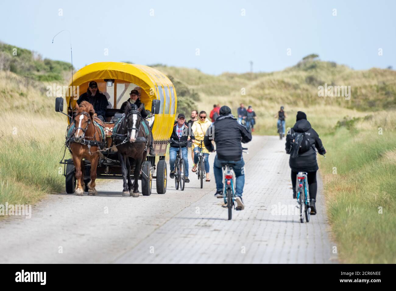 Germany, Lower Saxony, Juist, car-free island, covered wagon taxi. Stock Photo