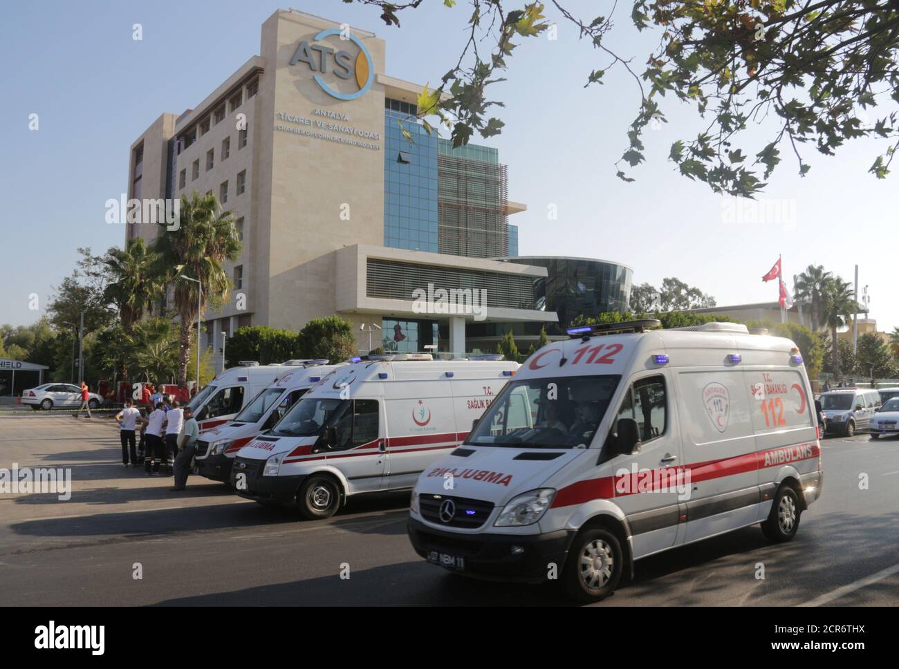 Ambulances are parked in front of the Antalya Chamber of Commerce and Industry (ATSO) headquarters after a blast in the Mediterranean resort city of Antalya, Turkey, October 25, 2016. REUTERS/Kaan Soyturk Stock Photo