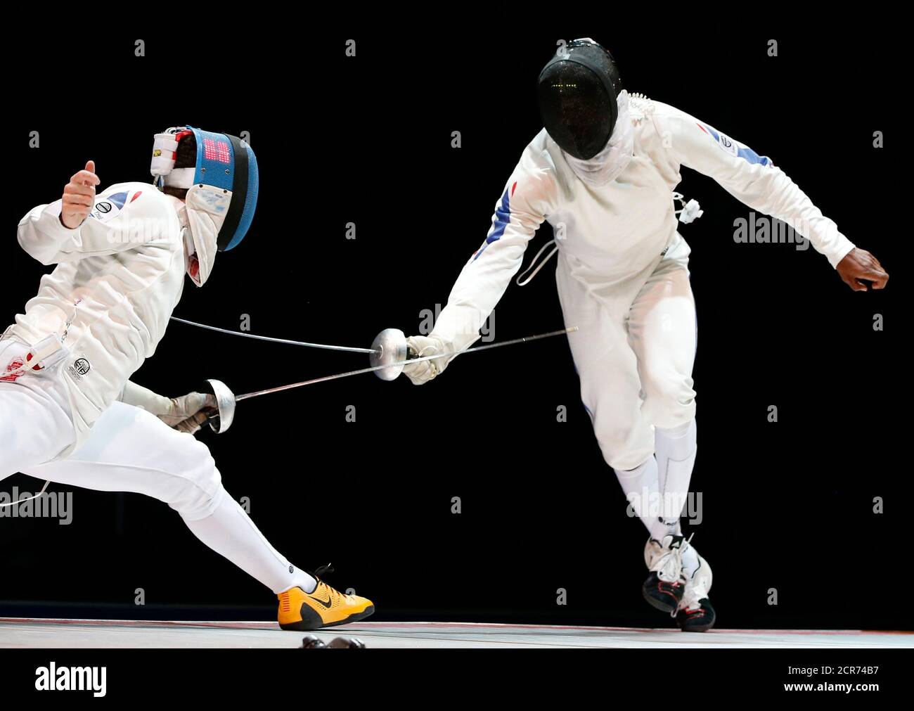 Gauthier Grumier (L) of France competes against his compatriot Ulrich  Robeiri during their men's epee semi-final at the World Fencing  Championships in Kazan July 20, 2014. REUTERS/Grigory Dukor (RUSSIA - Tags:  SPORT