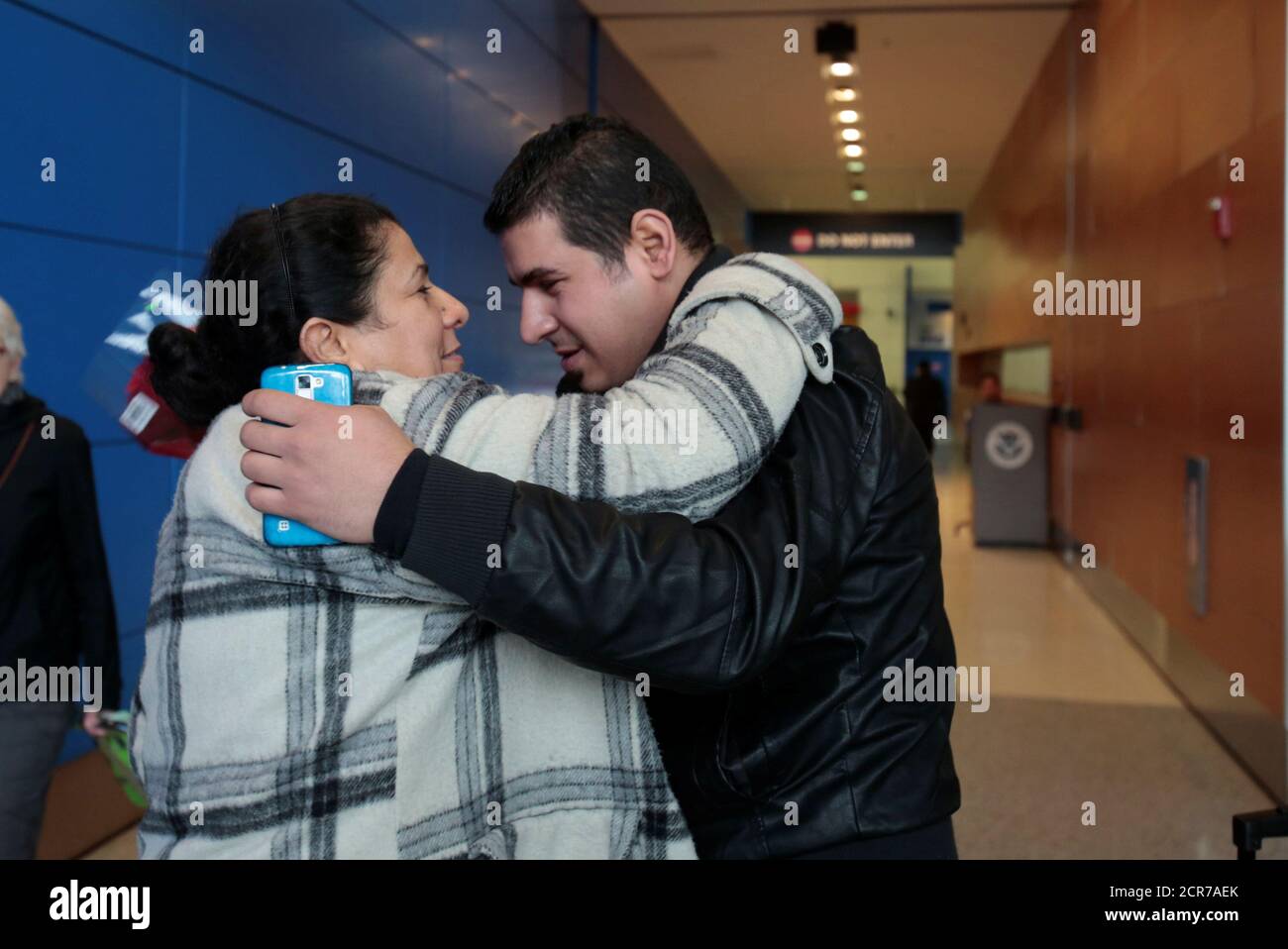 Iraqi refugee Amira Al-Qassab is reunited with her son Rami after arriving  with her other children at Detroit Metro Airport in Romulus, Michigan, U.S.  February 10, 2017. REUTERS/Rebecca Cook Stock Photo -