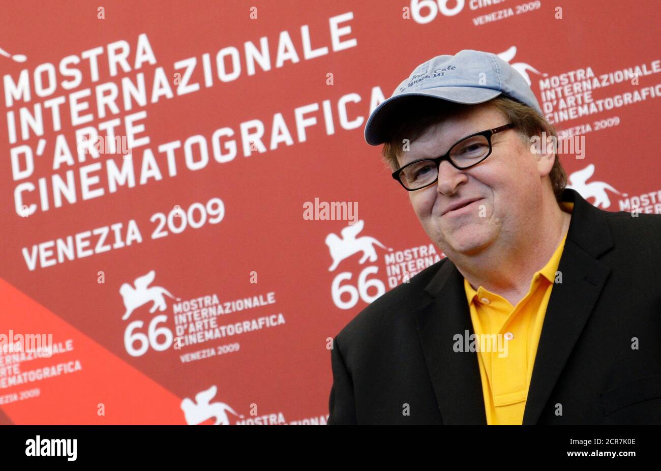 U.S. director Michael Moore poses during a photocall at the 66th Venice Film Festival September 6, 2009. Capitalism is evil. That is the conclusion U.S. documentary maker Moore comes to in his latest movie 'Capitalism: A Love Story', which premieres at the Venice Film Festival on Sunday. REUTERS/Tony Gentile (ITALY ENTERTAINMENT) Stock Photo