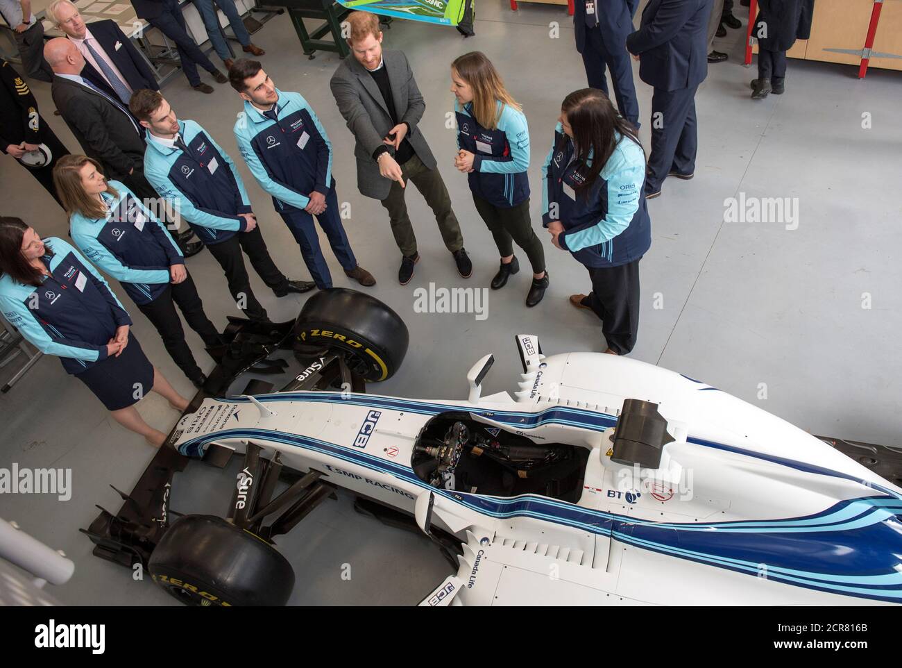 Britain's Prince Harry talks to staff from the Williams Racing team during a visit to the Silverstone University Technical College at Silverstone, Britain, March 7, 2018. REUTERS/Arthur Edwards/Pool Stock Photo