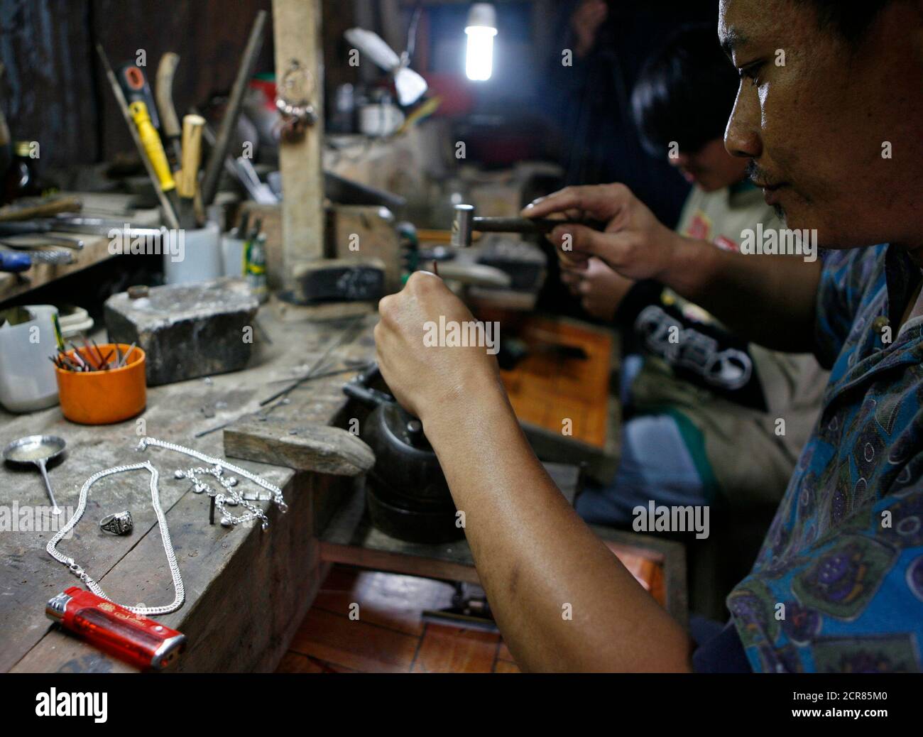 Workers Make Gold And Silver Jewellery In Mt Diwalwal Monkayo Town In Compostela Valley Province Southern Philippines February 8 07 Locals Discovered Diwalwal S Gold In The Early 1980s And Several Years Later