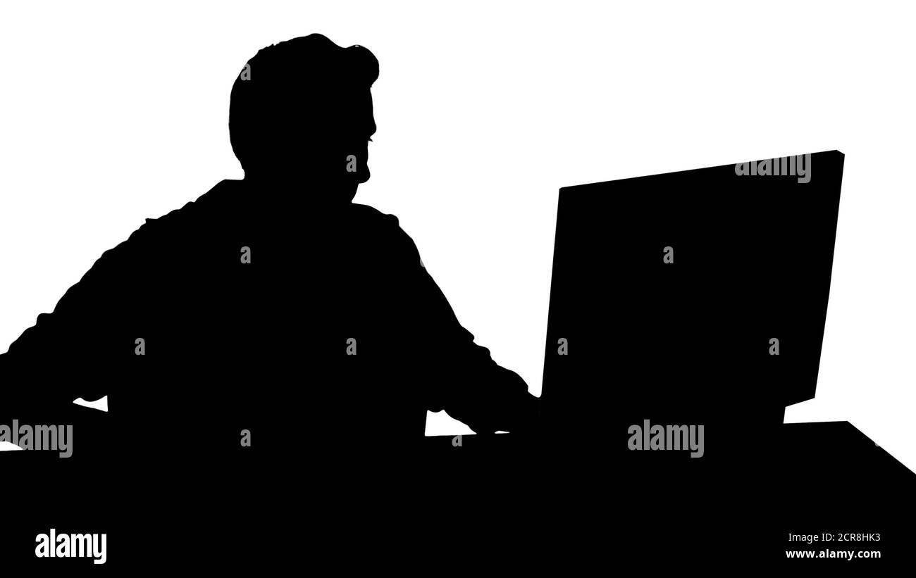 Silhouette Happy emotions of a gamer watching steam. Stock Photo