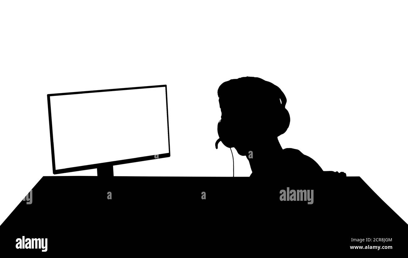 Silhouette Gamer talking about the game on the screen to camera. Stock Photo