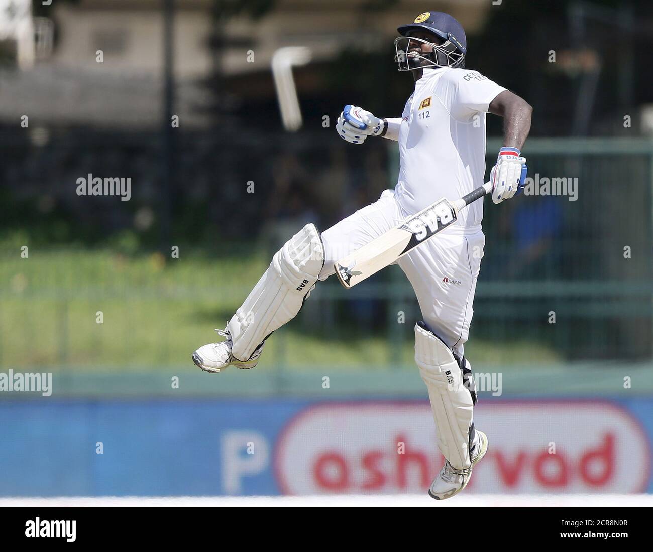 Sri Lanka's captain Angelo Mathews celebrates his century during the final day of their third and final test cricket match against India in Colombo, September 1, 2015. REUTERS/Dinuka Liyanawatte Stock Photo