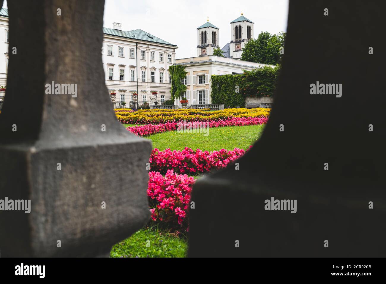 Mirabellgarten, Schlossgarten, Mirabell Palace, with the towers of the Andräkirche in the background, Salzburg, Austria, Europe Stock Photo