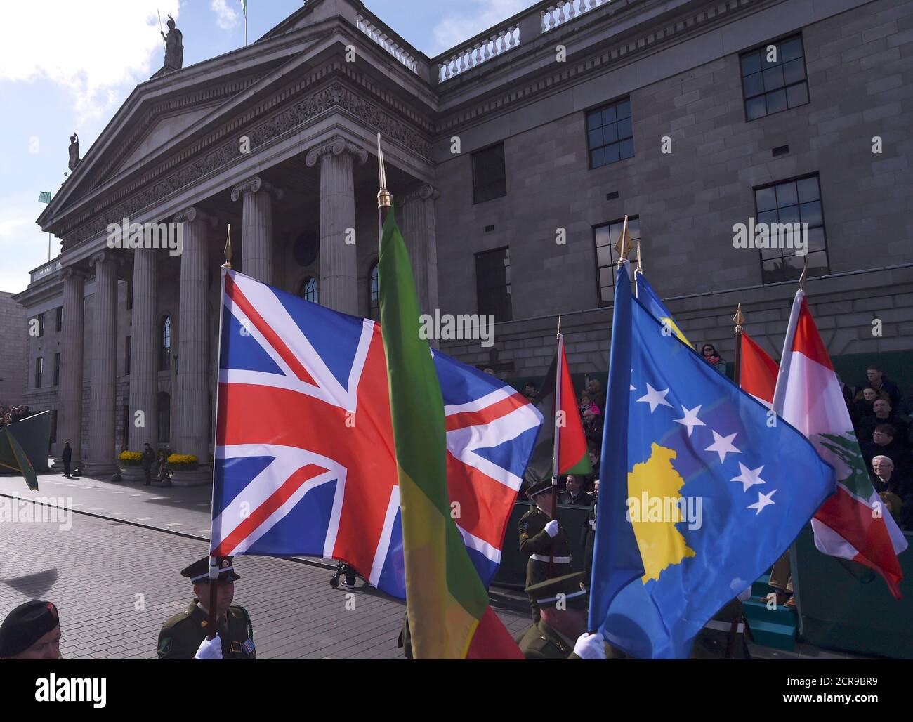 Britain and Ireland's flags fly outside the GPO building during the commemoration of the 100 year anniversary of the Irish Easter Rising in Dublin, Ireland, March 27, 2016. REUTERS/Clodagh Kilcoyne Stock Photo