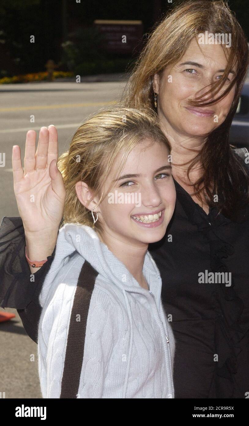 Emma Roberts (L), a cast member in the motion picture "Grand Champion,"  poses with her mother Kelly Cunningham as they arrive for the premiere of  the film in the Westwood section of