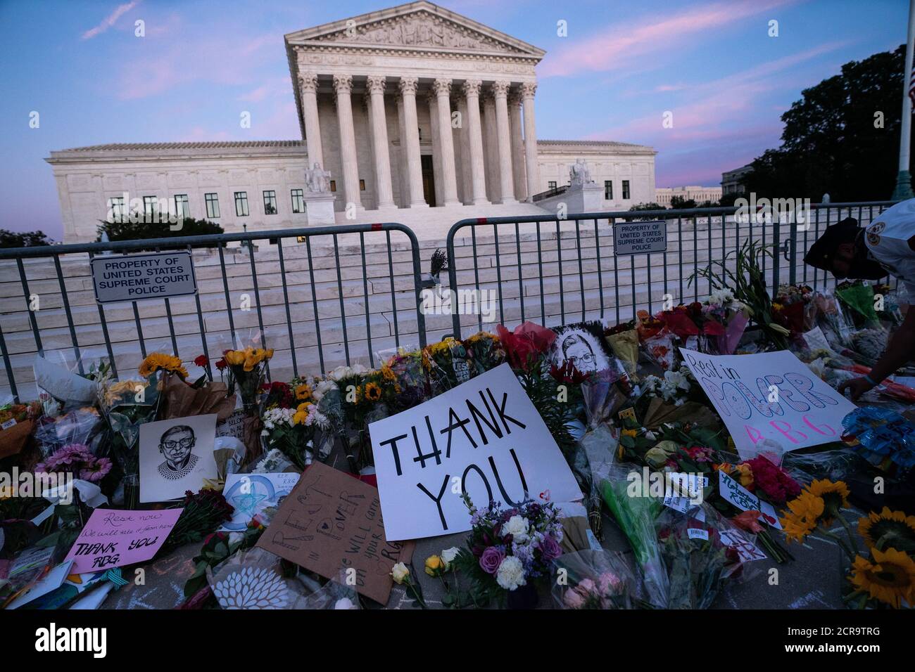 Washington, United States. 19th Sep, 2020. Flowers and messages are seen outside of the Supreme Court as people pay their respects to the late Justice Ruth Bader Ginsburg at the United States Supreme Court in Washington, DC on Saturday, September 19, 2020. Ginsburg died yesterday at 87 after a battle with pancreatic cancer. Photo by Kevin Dietsch/UPI Credit: UPI/Alamy Live News Stock Photo
