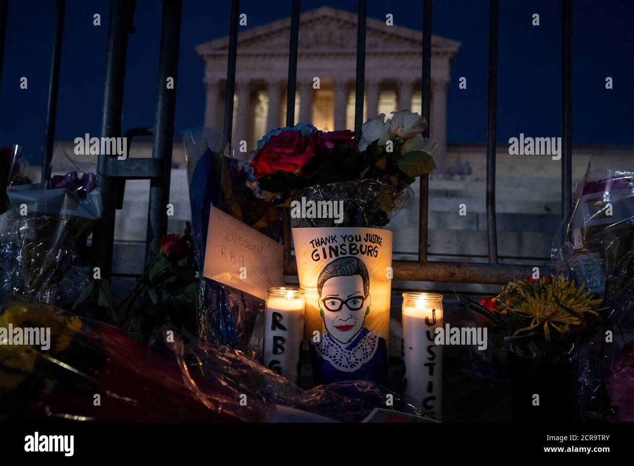 Washington, United States. 19th Sep, 2020. Flowers and messages are seen at the Supreme Court as people pay their respects to the late Justice Ruth Bader Ginsburg at the United States Supreme Court in Washington, DC on Saturday, September 19, 2020. Ginsburg died yesterday at 87 after a battle with pancreatic cancer. Photo by Kevin Dietsch/UPI Credit: UPI/Alamy Live News Stock Photo