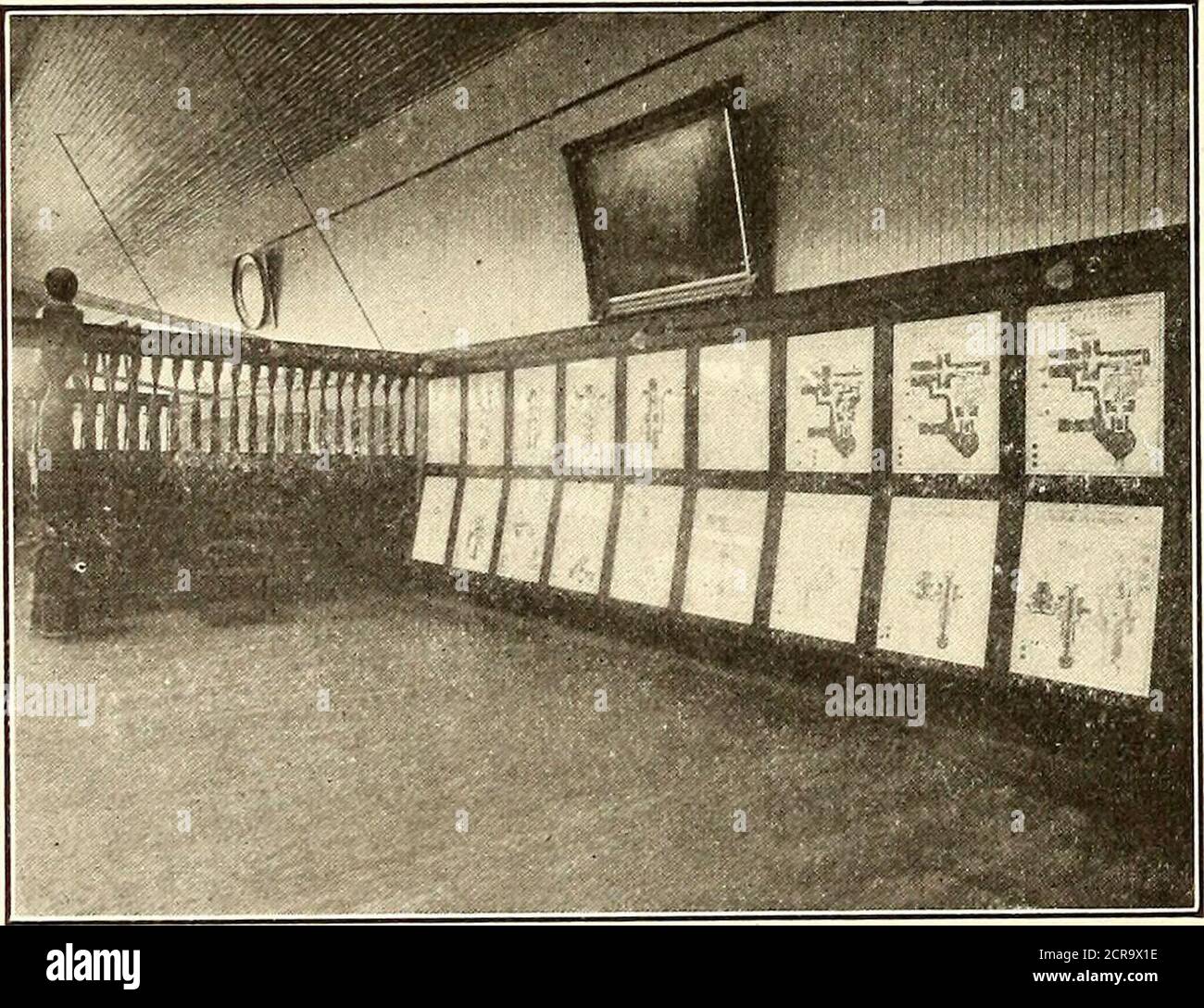 . The Street railway journal . FIG. 7.—BILLIARD ROOM IN THE OAKLAND TRACTION COM-PANYS CLUB ROOMS pany. The partitions are heavy and open pillared at the top,the construction being of a pleasing Colonial style. The entire eastern half of the second floor is occupied bythe gymnasium, lockers, lavatories and baths. The gymnasiumis a large, airy room, as may be seen from Fig. 9. It isequipped with vaulting horses, ladders, weight machines,. stantially shown by the company, and have more desire towork for its interests and welfare. In short, the clubroomsare a success and are proving profitable al Stock Photo