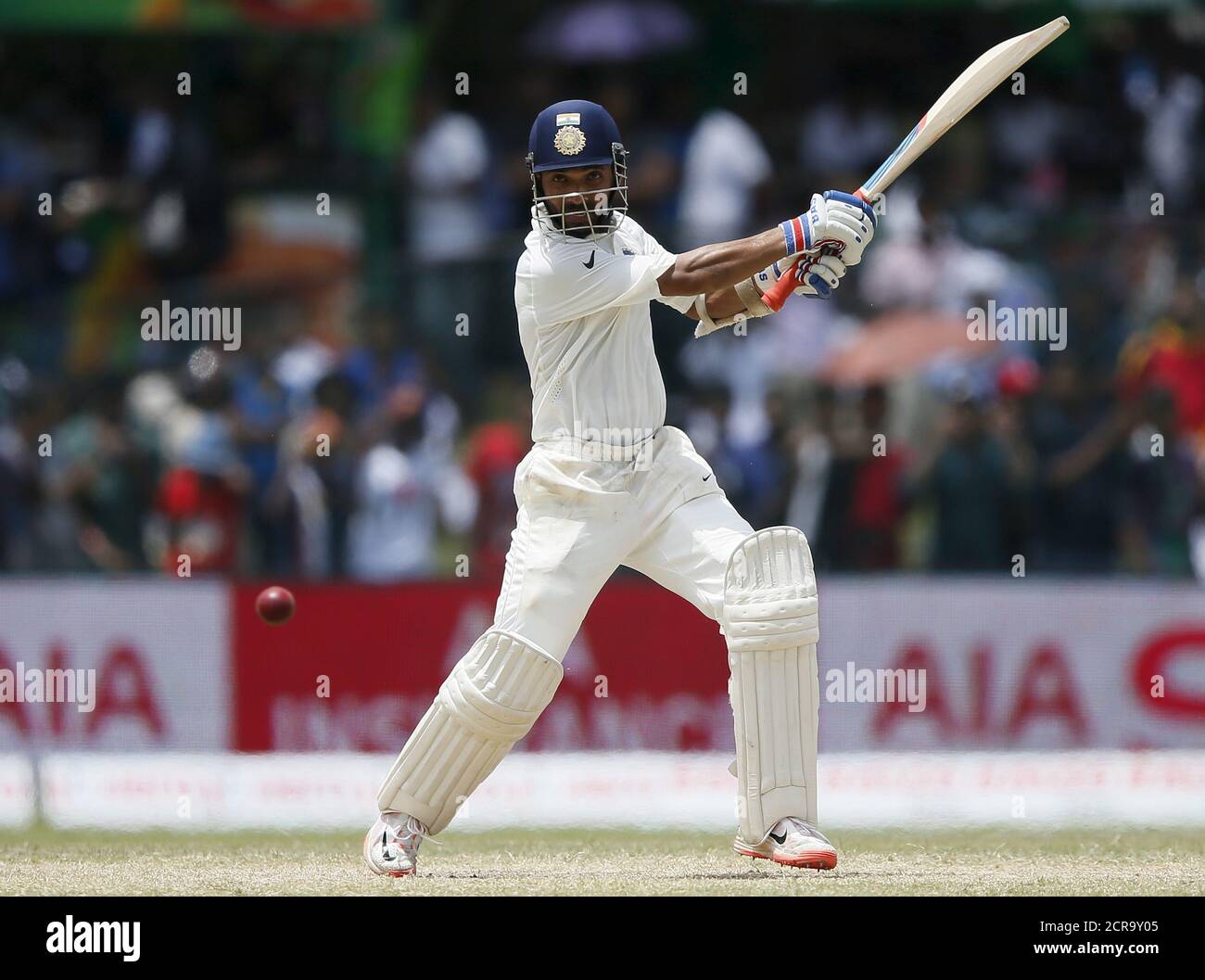 India's Ajinkya Rahane hits a boundary during the fourth day of their second test cricket match against Sri Lanka in Colombo August 23, 2015. REUTERS/Dinuka Liyanawatte Stock Photo