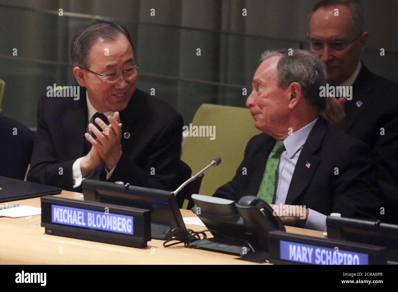 United Nations Secretary General Ban Ki-moon (L) applauds after former New York City mayor Michael Bloomberg (R) spoke during the CERES Investor Summit on Climate Risk at the United Nations headquarters in the Manhattan borough of New York, January 27, 2016.     REUTERS/Carlo Allegri Stock Photo