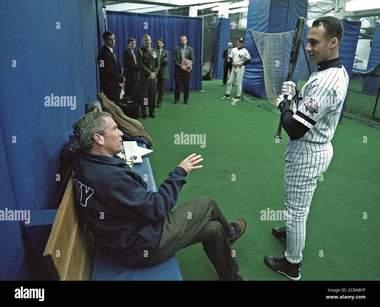 President George W. Bush talks with Yankee shortstop Derek Jeter Tuesday, Oct. 30, 2001, before throwing out the ceremonial first pitch in Game Three of the World Series between the Arizona Diamondbacks and the New York Yankees at Yankee Stadium in New York.  Photo by Eric Draper, Courtesy of the George W. Bush Presidential Library Stock Photo