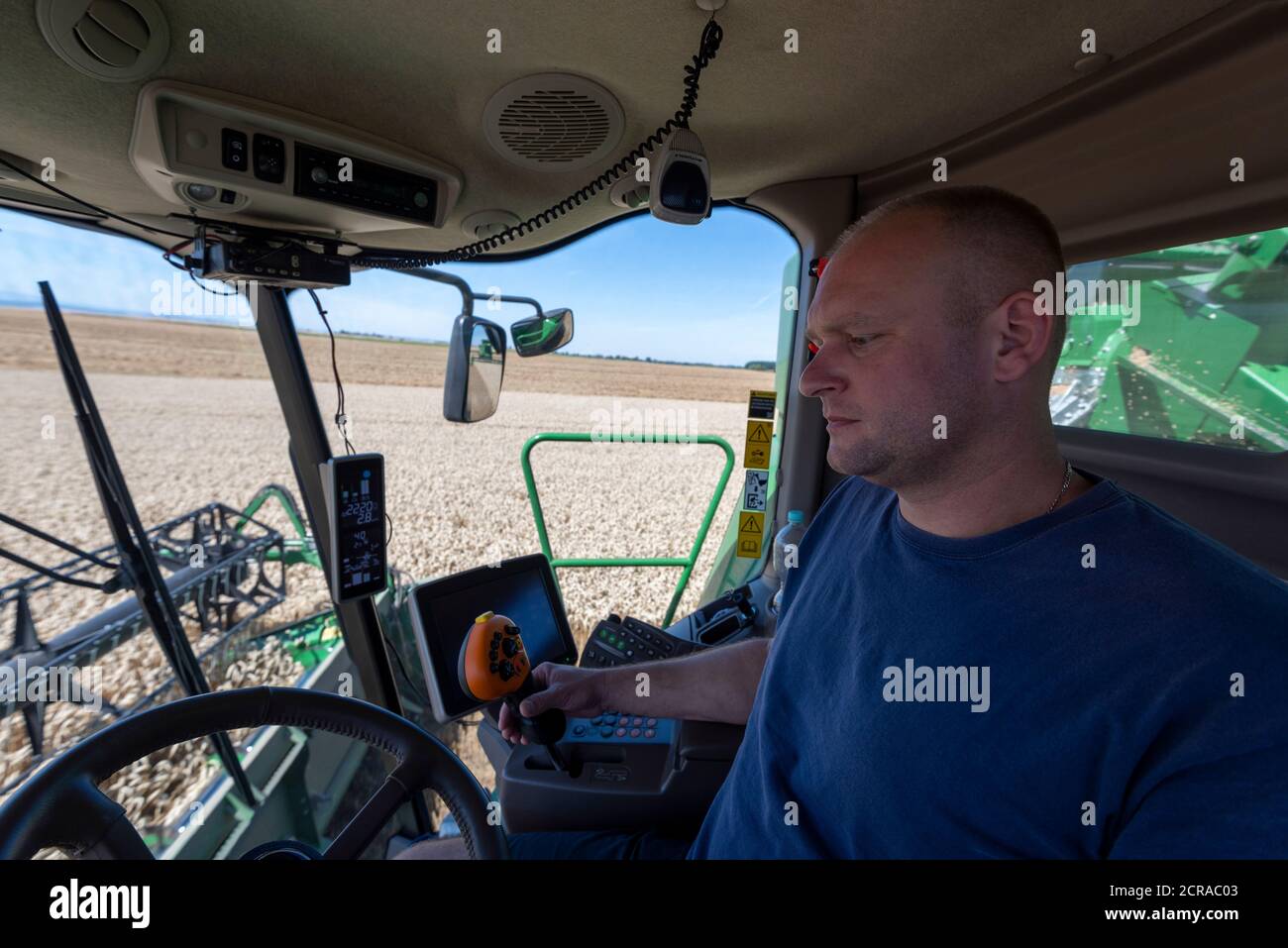 Cockpit of a combine harvester, driver Stock Photo