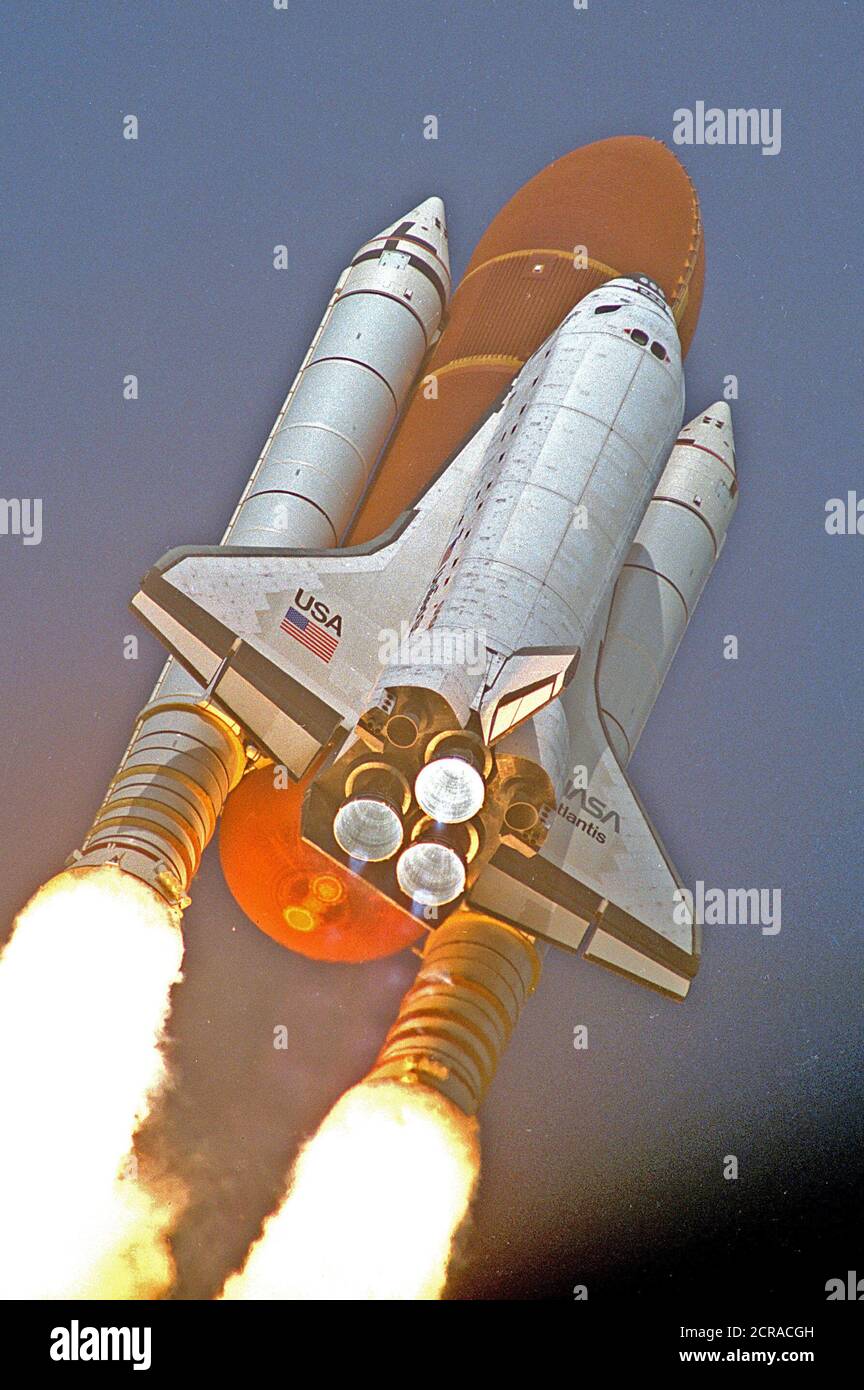 The Space Shuttle Atlantis thunders skyward from Launch Pad 39A. Liftoff of Mission STS-45 occurred at 8:13:40 a.m. EST, March 24, 1992. On board for the 46th Shuttle flight Atmospheric Laboratory for Applications and Science-1 (ATLAS-1). The launch is the second in 1992 for the Shuttle program and Atlantis' 11th flight. Stock Photo