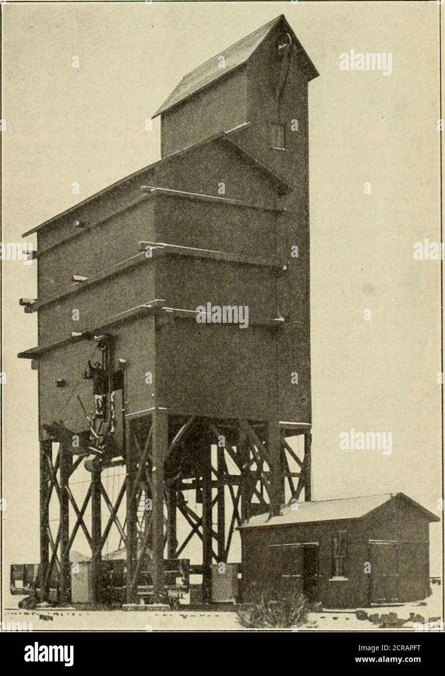 . American engineer and railroad journal . 300 TON COALING STATION ERECTED BY FAIRBANKS, MORSE fit CO., ATAUGUSTA, KAN. THIS STATION IS TYPICAL OF THE LARGE NUMBERERECTED BY THIS COMPANY FOR THE SANTA FE AND IS PROVIDED WITHlO-TON AUXILIARY SCALE POCKETS, WHICH PERMIT THE ACCtn!ATEWEIGHING OF THE COAL PUT ON EACH LOCOMOTIVE TENDER. THISSTATION COALS FOUR TR.CKS AND OTHERS OF THE SAME TYPE WITH-OUT THE BRIDGE COAL TWO TRACKS. COALING STATION ERECTED AT BECKER, N. M., BY THE ROBERTS &SCHAEFER CO. THIS PLANT IS TYPICAL OF FOUR PLANTS CONSTRUCT-ED ON THE EASTERN RAILWAY OF MEXICO AND USES THE HOL Stock Photo