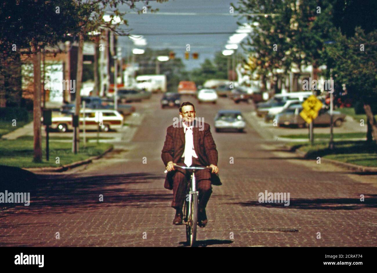 Associate County Court Judge Fred Burns on his daily bike ride to the Seward County courthouse, May 1972 Nebraska Stock Photo