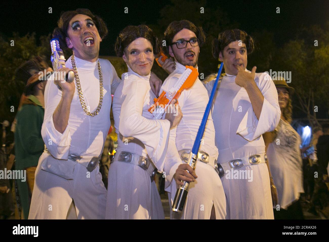 A group men dressed as Star Wars character Princess Leia pose at the West Hollywood Halloween Costume Carnaval, which attracts nearly 500,000 people annually, in West California October 31, 2015.