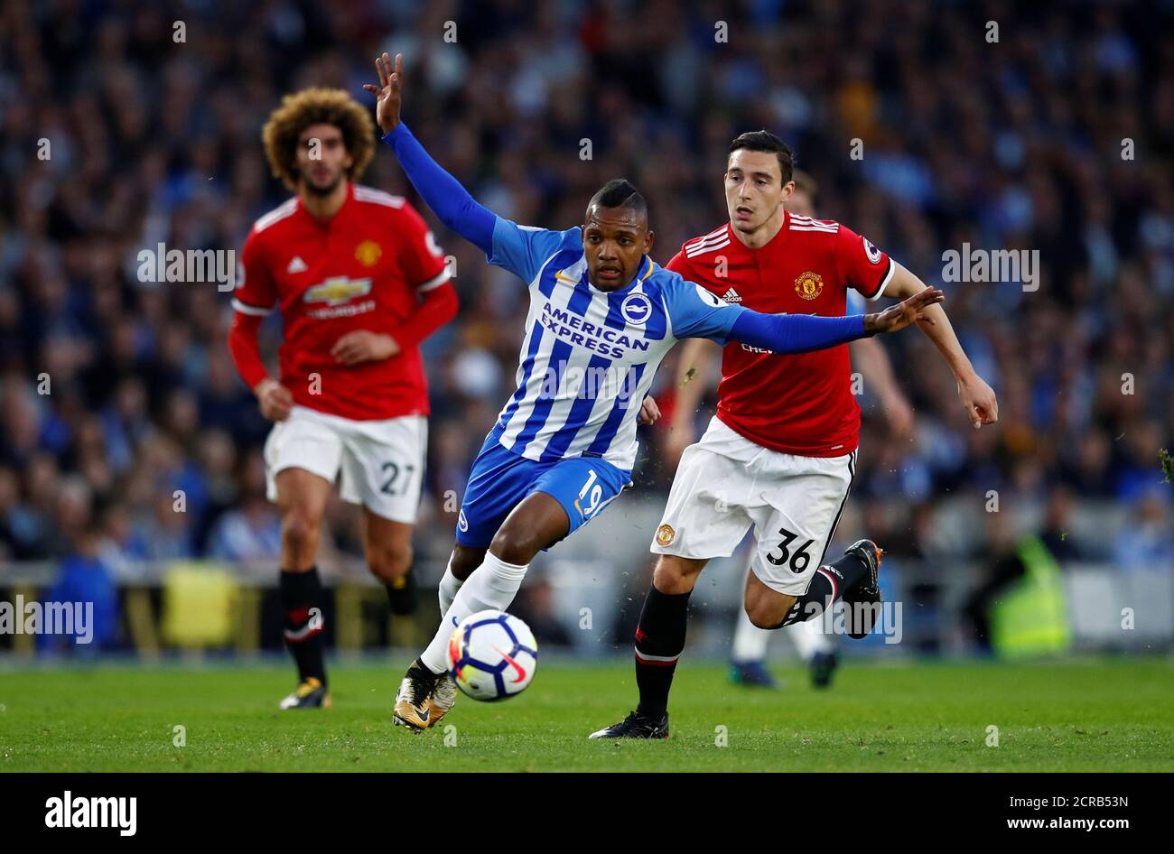 Soccer Football - Premier League - Brighton & Hove Albion v Manchester United - The American Express Community Stadium, Brighton, Britain - May 4, 2018 Brighton's Jose Izquierdo in action with Manchester United's Matteo Darmian REUTERS/Eddie Keogh EDITORIAL USE ONLY. No use with unauthorized audio, video, data, fixture lists, club/league logos or "live" services. Online in-match use limited to 75 images, no video emulation. No use in betting, games or single club/league/player publications. Please contact your account representative for further details. Stock Photo