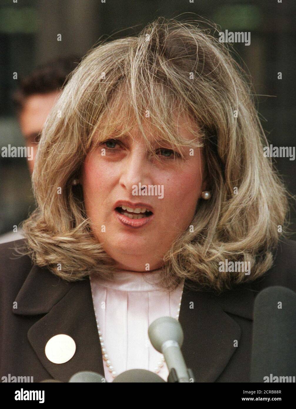 Linda Tripp was fired from her Department of Defense position January 19, 2001 by the Clinton administration after she refused to resign like other political appointees. Tripp speaks to reporters outside the U.S. Courthouse in Washington in this July 29, 1998 file photo. Tripp's taping of Monica Lewinsky set in the motion the events that lead to President Bill Clinton's impeachment.  BM/RCS Stock Photo