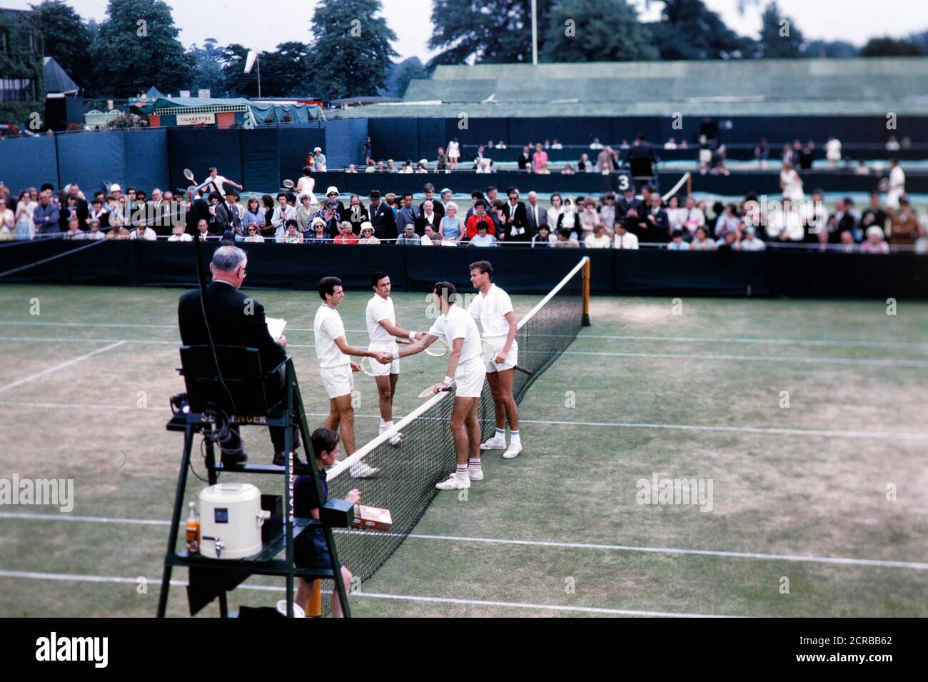 Tennis players shaking hands at center court, Wimbledon 1965 Stock Photo