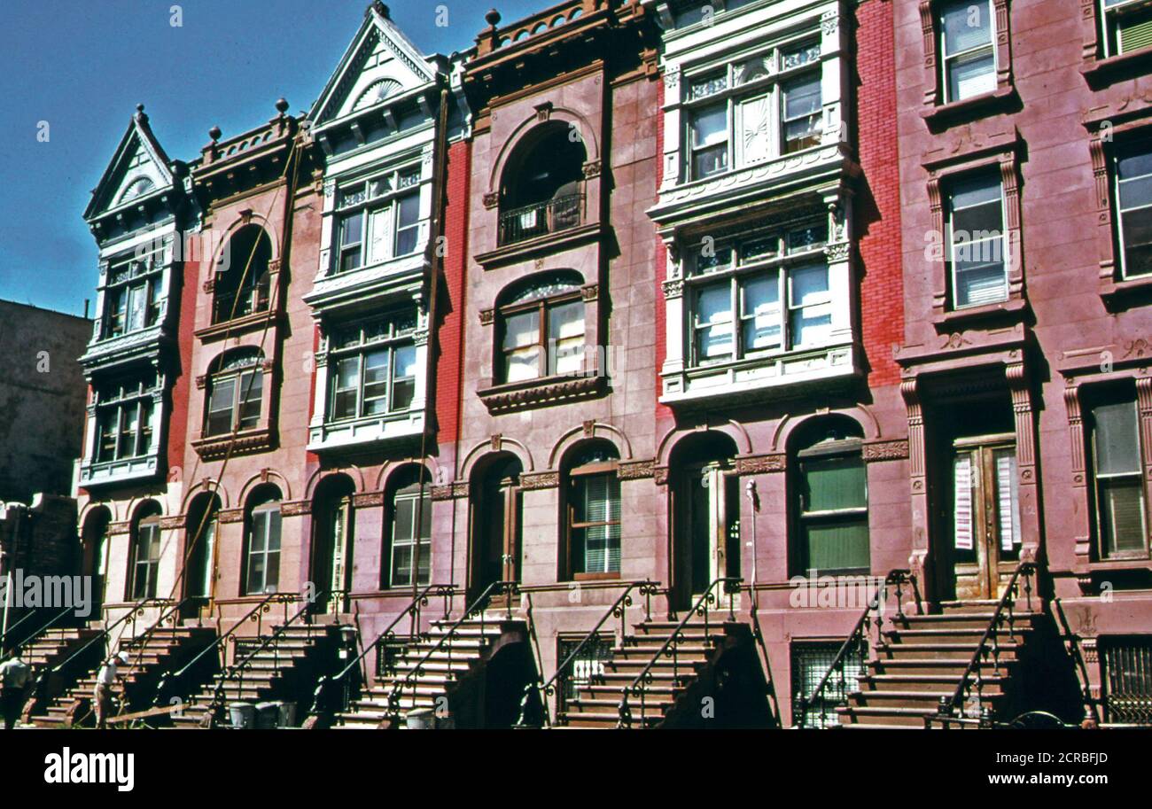 Turn of the Century Brownstone Apartments Being Painted and Renovated by Owners in Brooklyn which Remains One of America's Best Examples of a 19th Century City.  1974 Stock Photo