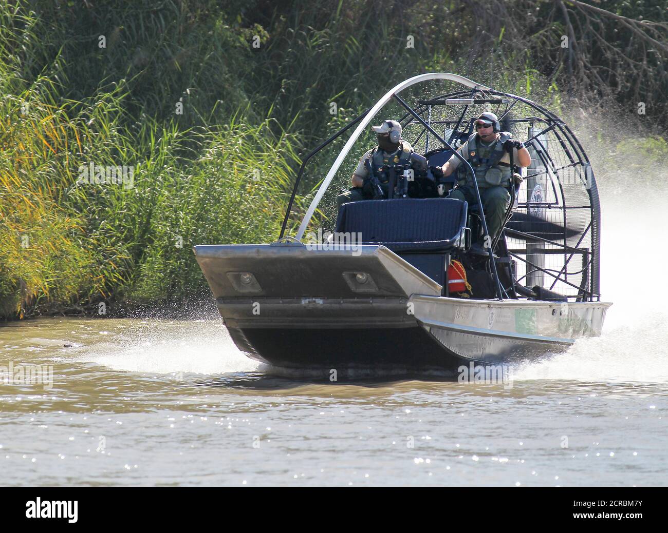 Border Patrol conducts patrols in an Air-Boat in South Texas, Laredo, along the Rio Grande Valley river on September 26, 2013. Stock Photo