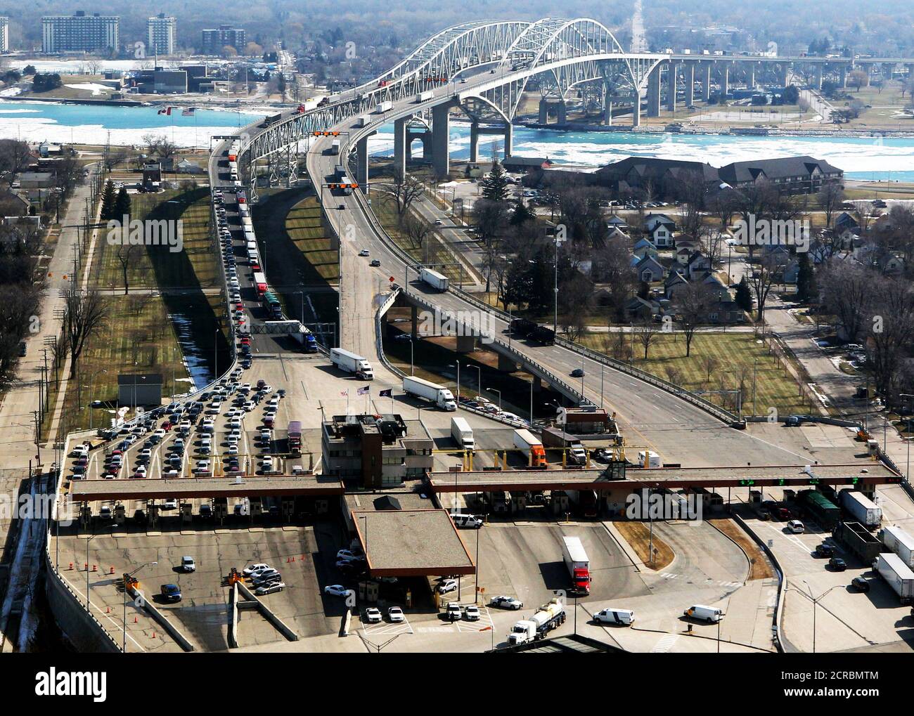 Traffic flows on Ambassador Bridge traveling to U.S. Port of Entry from Canada. It is the busiest international border crossing in North America in terms of trade volume (as of 2011 when this photo was taken) Stock Photo