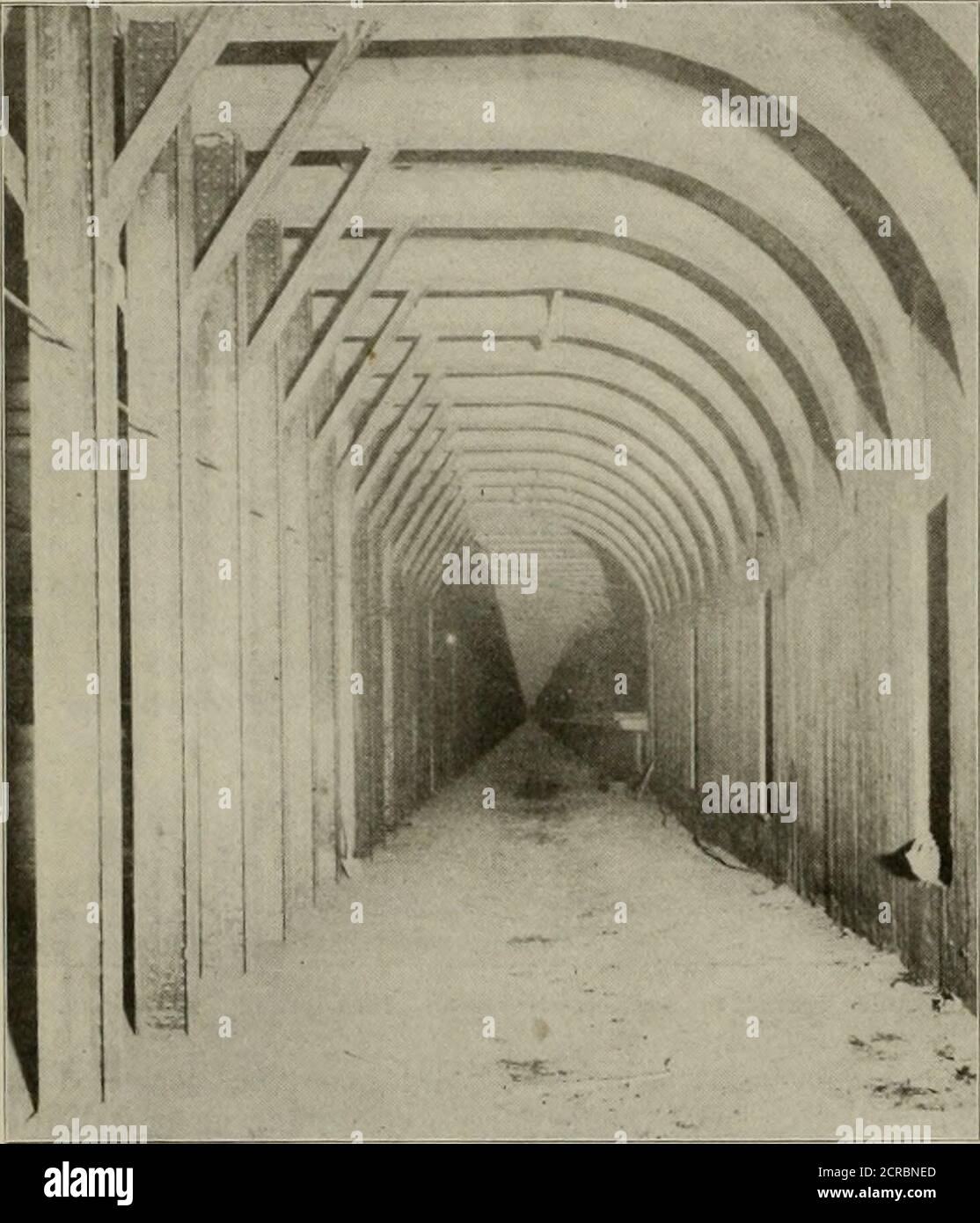 . Electric railway review . ave to be obtainedat once. Washington Street Tunnel. To obtain first relief it was decided to place a tunnelunder Washington street from near the Castle street inter-section, where the existing elevated now makes right-angledturns right and left; on the right, to the incline that leadsto the Tremont street subway; on the left, eventually, to theAtlantic avenue section. The tunnel would be reached by anincline from near this elevated junction and would terminateon the north at the Haymarket square station and incline ofthe present system. When dug and completed the W Stock Photo