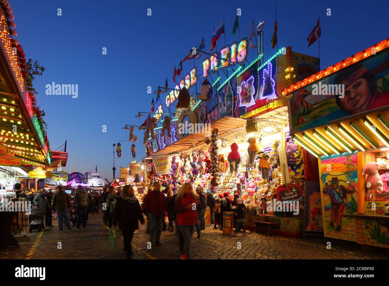 Losbude on the Bremer Freimarkt at dusk, Bremen, Germany, Europe Stock Photo