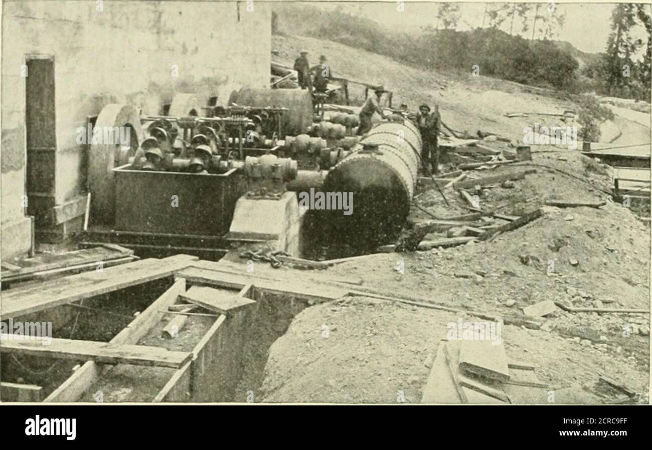 . The street railway review . ep-up transformers, high tension switching devices,lightning arresters and choke coils, and from this room the linewires are carried out through a usual form of opening. A gableroof covers the whole power house, and in the center apartment,where the roof is highest, a traveling crane of sufficient capacity tohandle any of the machinery, is installed. All walls of the powerhouse, even the two inner ones dividing the building into compart- 88 (|)UiM%lv^S&vlcv ments, are of massive concrete work, and as the roof is of corrugat-ed iron supported on iron trusses, t Stock Photo