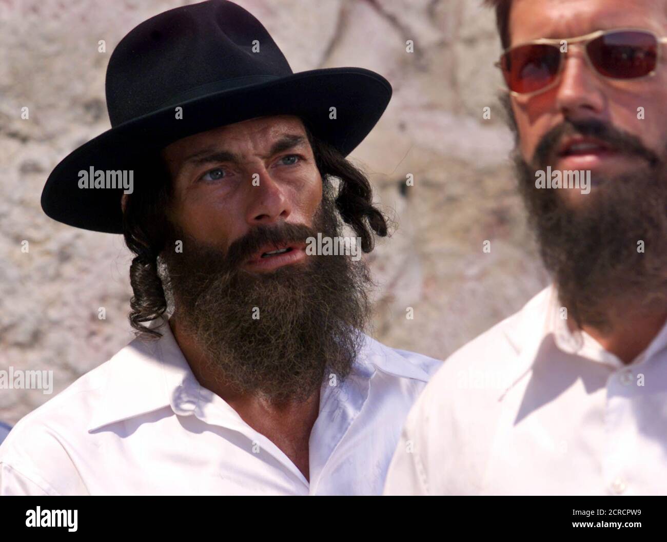 BELGIAN ACTOR JEAN CLAUDE VAN DAMME IS DRESSED AS AN ULTRA-ORTHODOX JEW  WHILE FILMING A MOVIE IN JERUSALEM. Belgian actor Jean Claude Van Damme  (L), clad in the costume of an ultra-Orthodox
