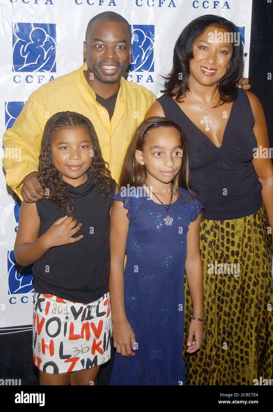 Actor Levar Burton and his family pose as the arrive at the fifth annual  Lullabies & Luxuries luncheon and fashion show benefiting Caring for  Children & Families with AIDS (CCFA) in Beverly