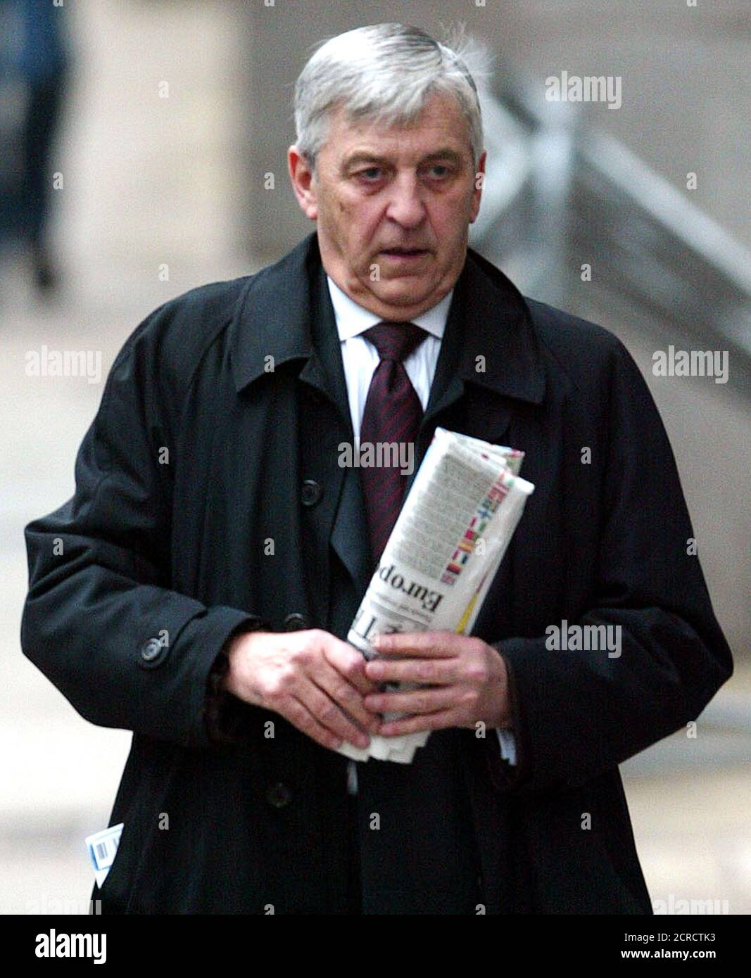Stephen Coward QC, defence lawyer for Britain's Ian Huntley, arrives at the Old Bailey for the Soham murder trial in London, December 12, 2003. Former school caretaker Huntley is charged with the double murder of British schoolgirls Holly Wells and Jessica Chapman in August 2002. REUTERS/Stephen Hird  SH/ASA/WS Stock Photo