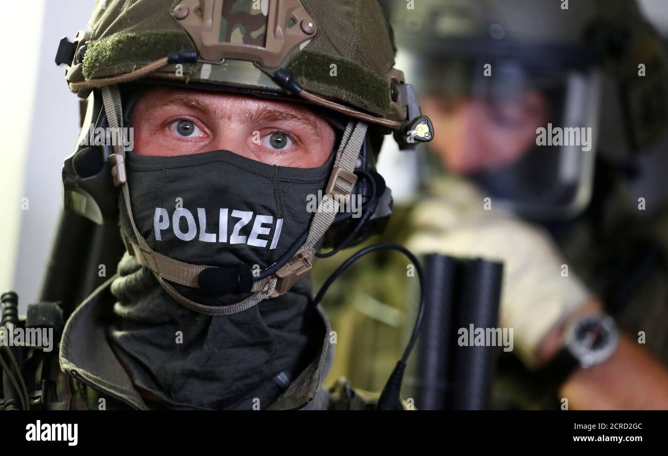 Members of the GSG 9 unit of Bundespolizei, Germany's federal police, are  pictured during the opening of a new headquarters for special forces and  anti-terror units in Berlin, Germany August 8, 2017.