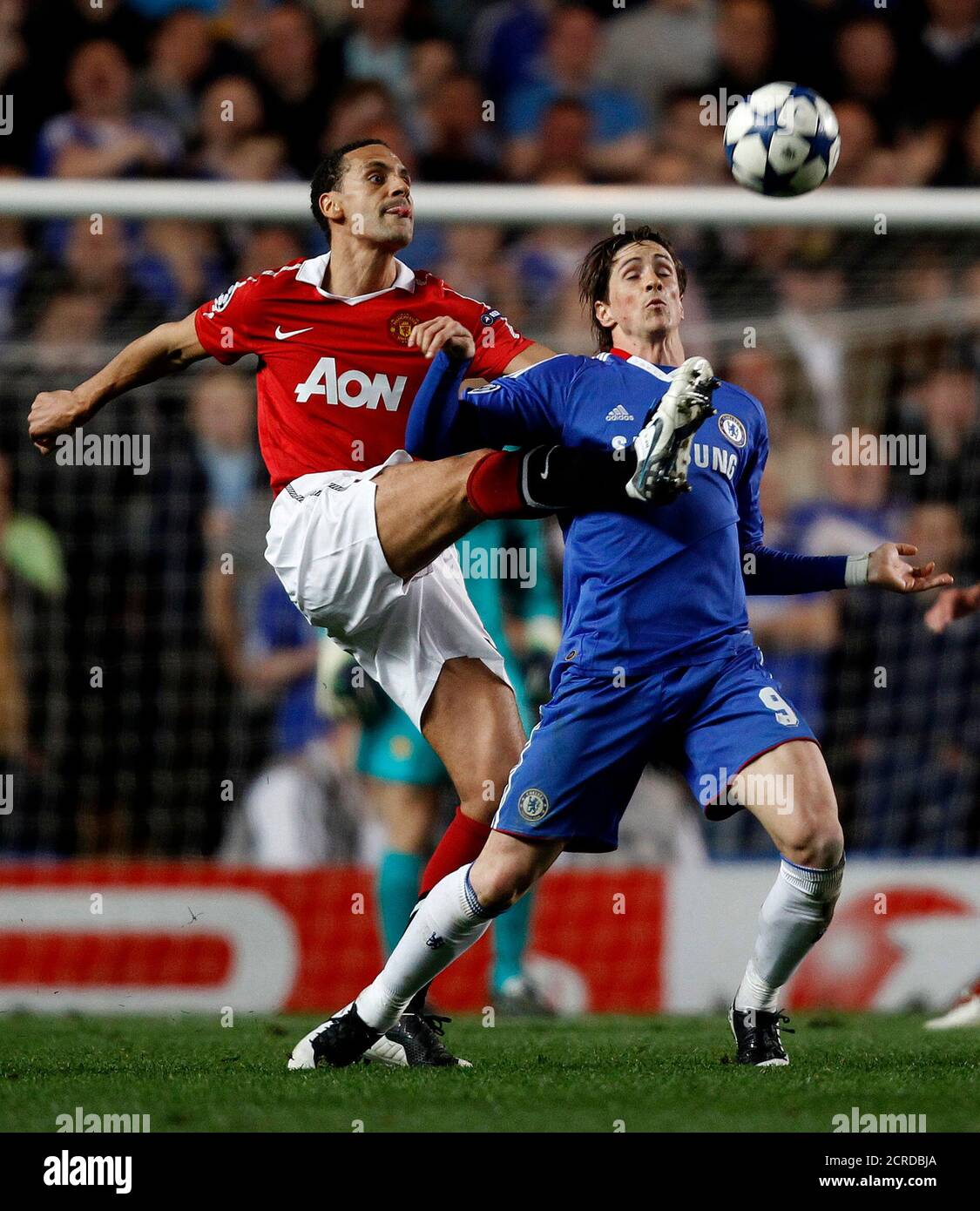 Manchester United S Rio Ferdinand L Challenges Chelsea S Fernando Torres During The First Leg Of Their Champions League Quarter Final Soccer Match At Stamford Bridge In London April 6 11 Reuters Stefan Wermuth Britain