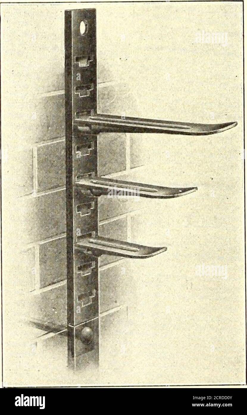. Electric railway journal . shown in thisdlustration is of the sin-gle-bolt type, good fora pull of 1200 lb. andintended for yi-in. and5/16-in. rope used fortrolley span wire, but atwo-bolt type good forVs-m. and 7/16-in.strands is also made,the difference beingthat the latter type inaddition to the extrabolt has a bridge in thecenter between thebolts to put a doublebend in the strandwhen the bolts are setup. This gives it aholding strength whichunder test has beenfound to be in excessof 15,000 lb. The cable bracketwhich has been brought New Cable Accessories—Adjust-out as a part of the able Stock Photo