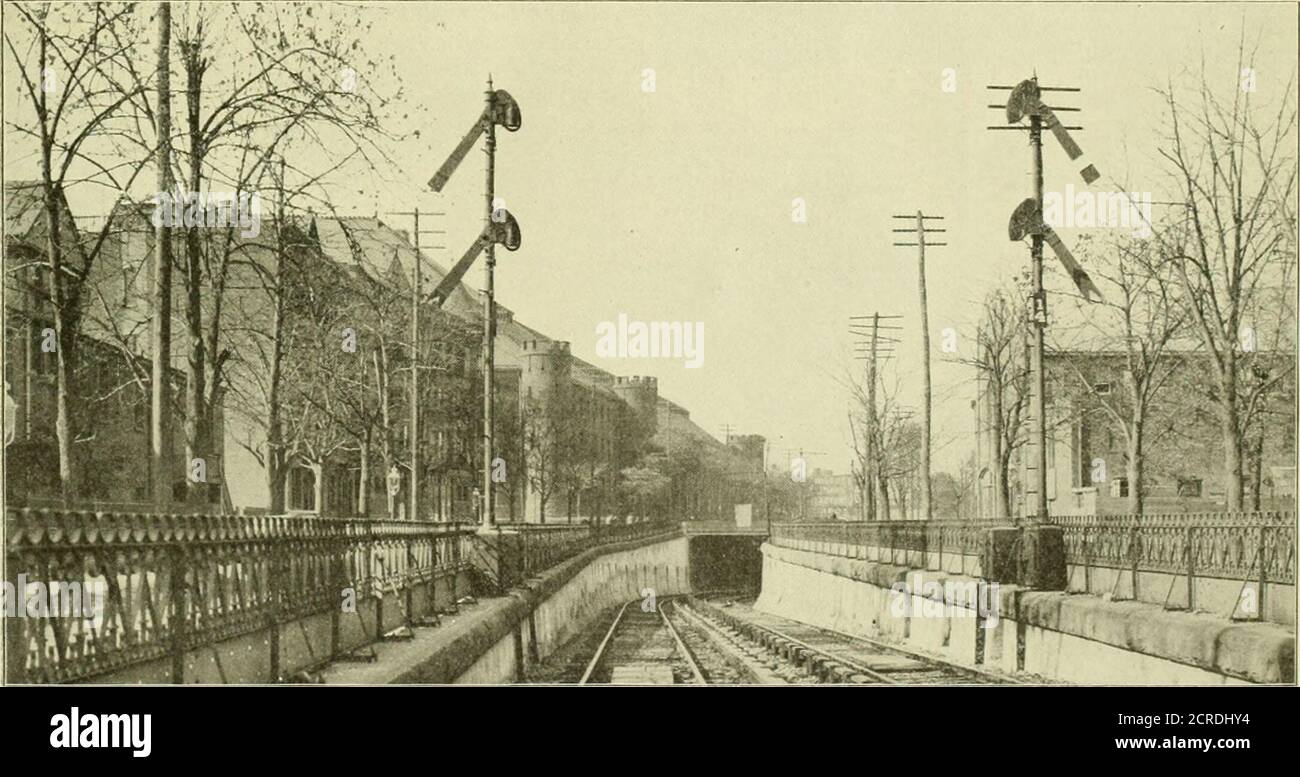 . Electric railway review . Fig. 1—Light Sign,il in FInthiish Siitaw,-iy, feet, with the transformers connected at one end of thesection, and from 1,300 feet to 2,800 feet with the trans-formers connected in intermediate positions. The motor signals used are of the Union Switch & Sig-nal Companys standard style B type, of which there are. Fi3. 2—Signals Electrified Lines. Long Island Railroad—Subway Portal at Nostrand Avenue. signals Include all of the four-track road and 12 miles ofthe two-tiack road mentioned, extending from Flatbush ave-nue in Brooklyn to Queens and from Woodhaven Junctiont Stock Photo