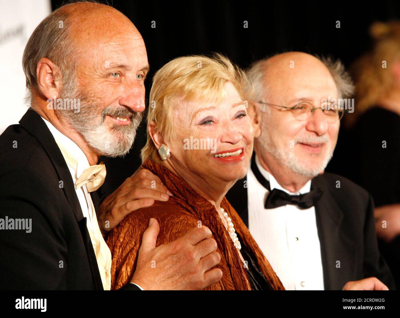 Honorees Paul Stookey, Mary Travers and Peter Yarrow of Peter, Paul and Mary arrive at the 2006 Songwriters Hall of Fame induction ceremony at the Marriott Marquis Hotel in New York June 15, 2006. REUTERS/Eric Thayer (UNITED STATES) Stock Photo