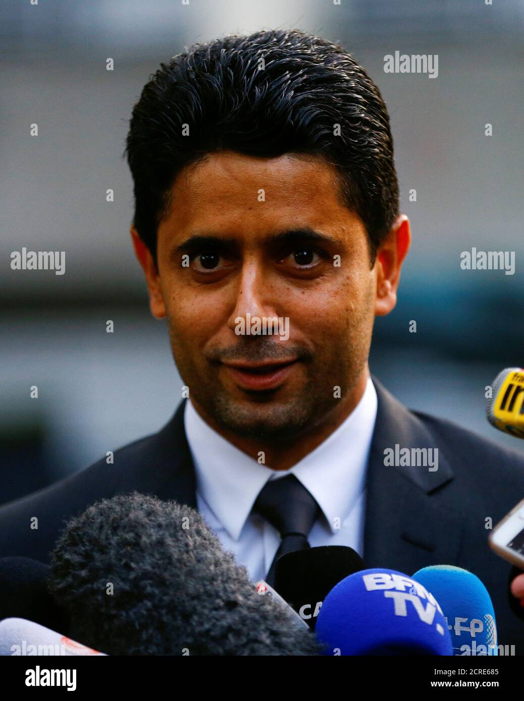 Nasser Al-Khelaifi, CEO of Qatar's beIN Media and president of French  soccer club Paris St Germain (PSG) talks to the media after he was  questioned as part of a criminal investigation into