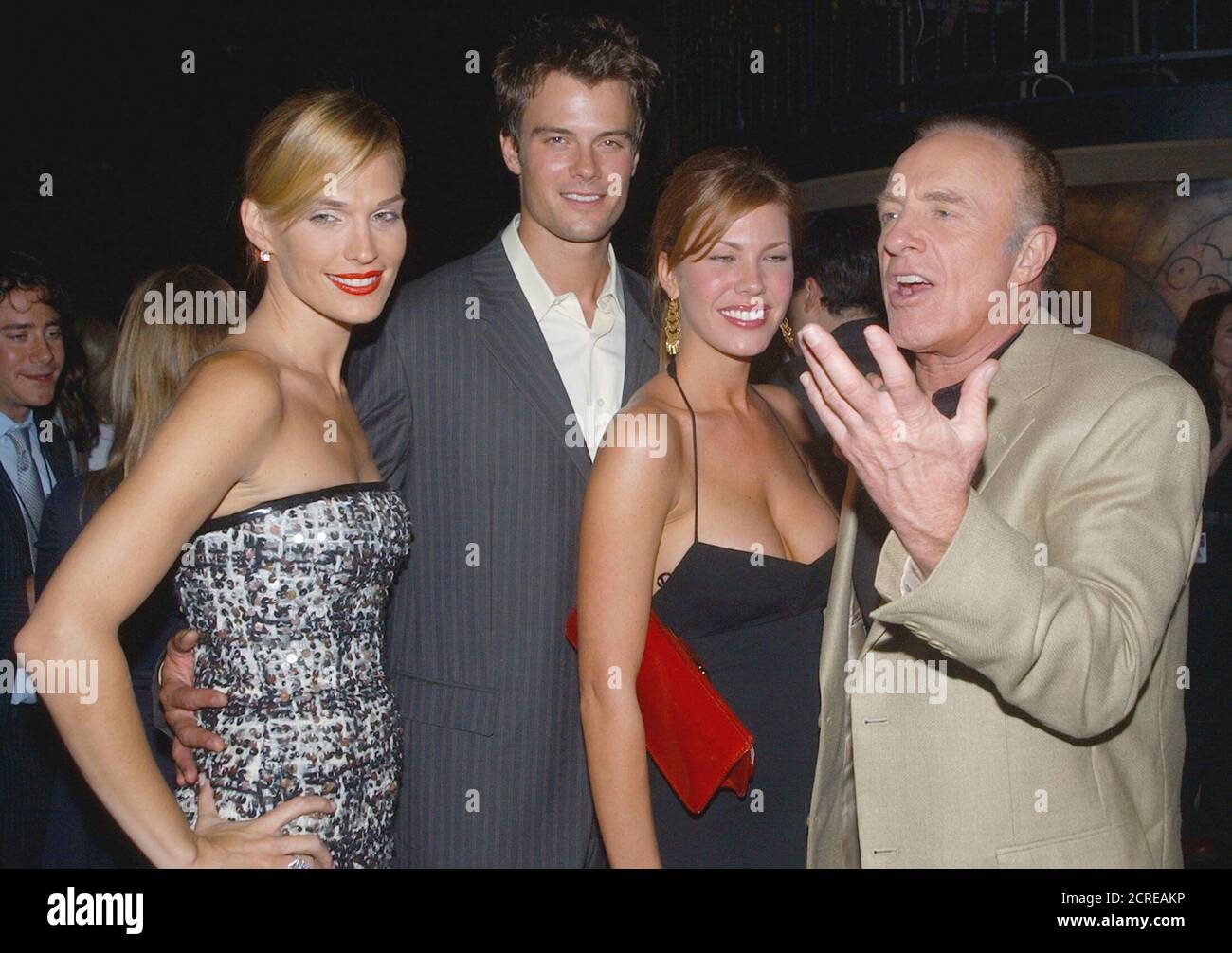 Molly Sims, Josh Duhamel, Nikki Cox and James Caan (L-R), cast members in  the new NBC drama series "Las Vegas," share a light moment as they pose  following the premiere screening of