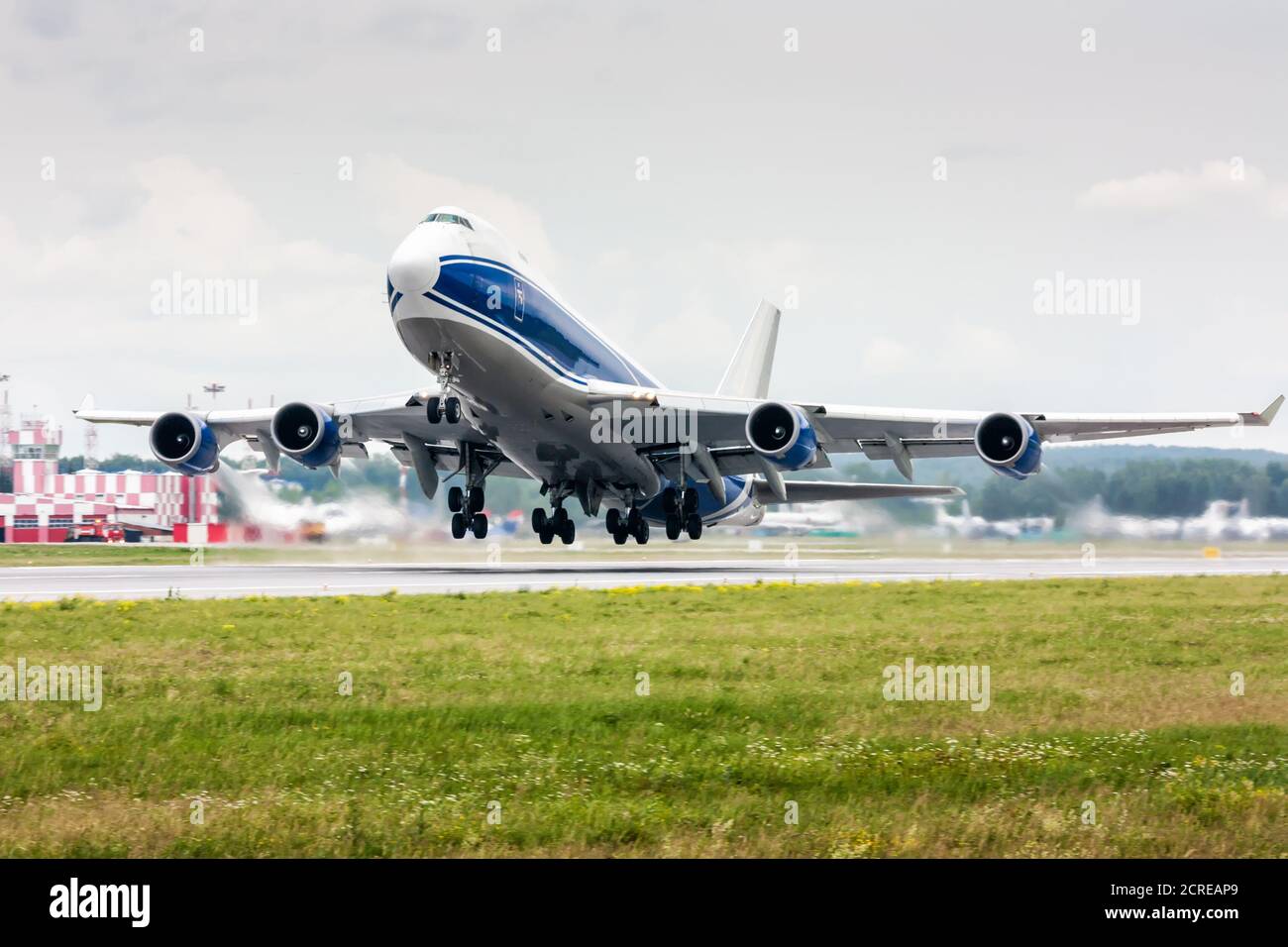 Take off of the wide body cargo airplane Stock Photo