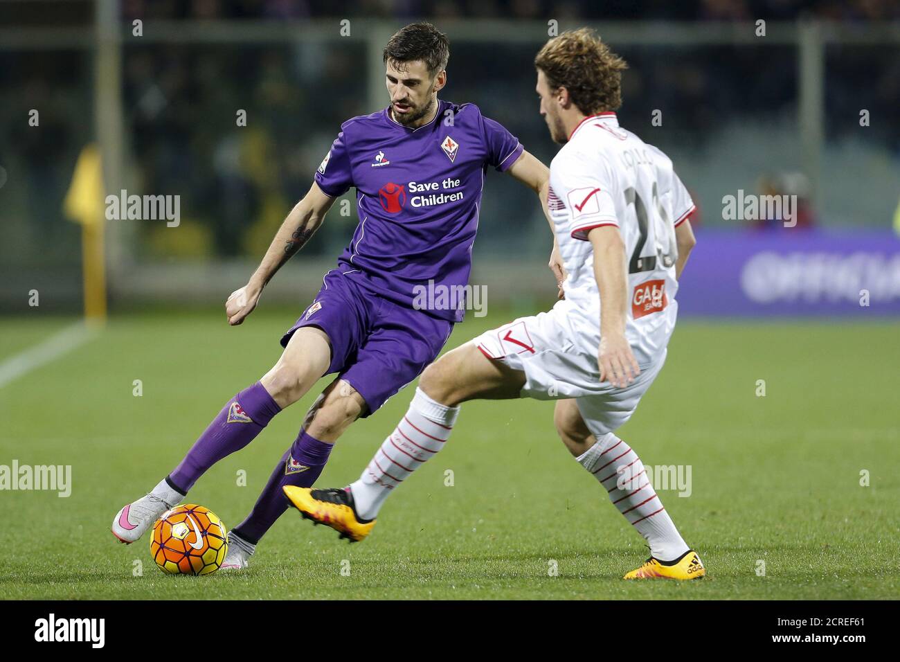 Football Soccer - Fiorentina v Carpi - Italian Serie A - Artemio Franchi  stadium, Florence, Italy 03/02/16Mauro Zarate of Fiorentina in action  against Fabrizio Poli (R) of CarpiREUTERS/Giampiero Sposito Stock Photo -  Alamy